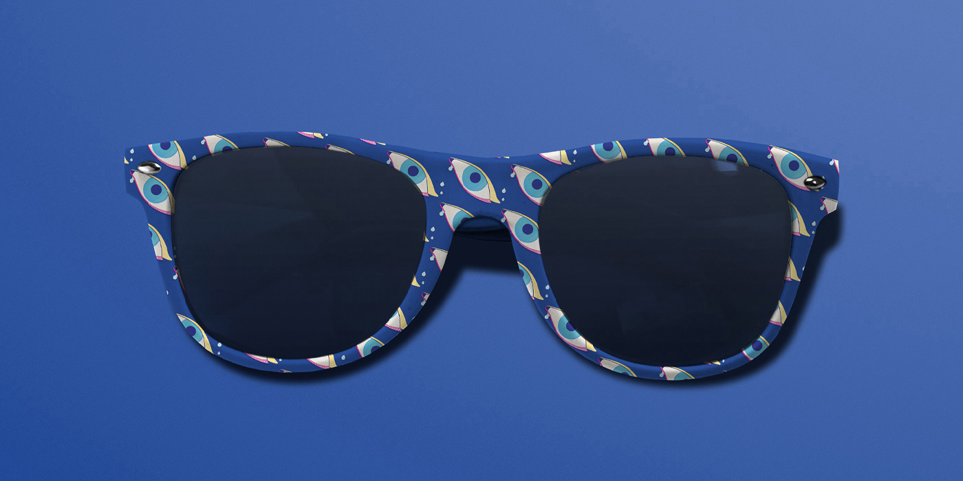 Lunettes de soleil bleues habillées du motif "oeil" Pop Art
